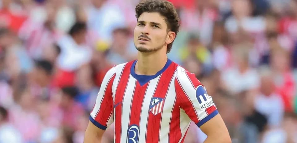 Atletico Madrid player looking upwards during match