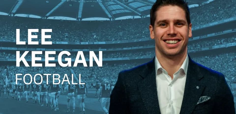 Lee Keegan in front of a football stadium
