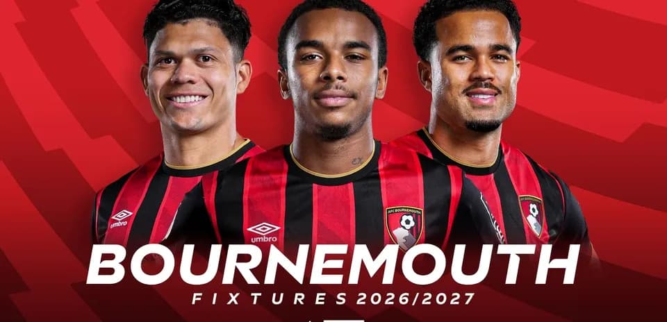 AFC Bournemouth players posing in team kits