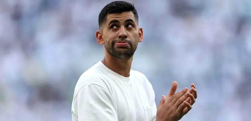 Player clapping during pre-match warm-up