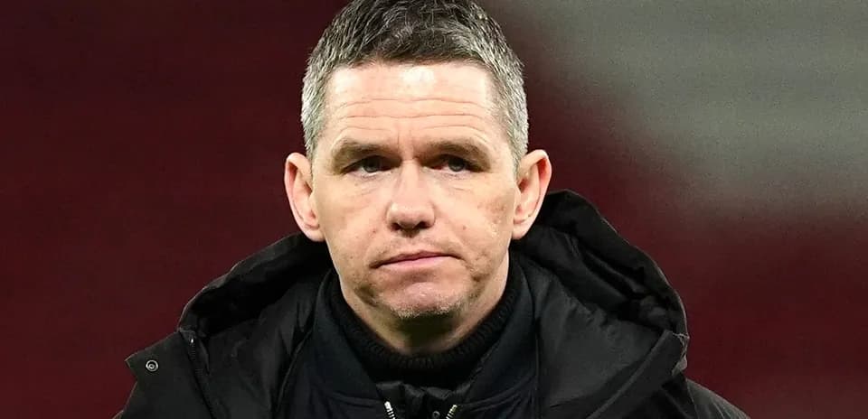 Football manager on the sidelines during match