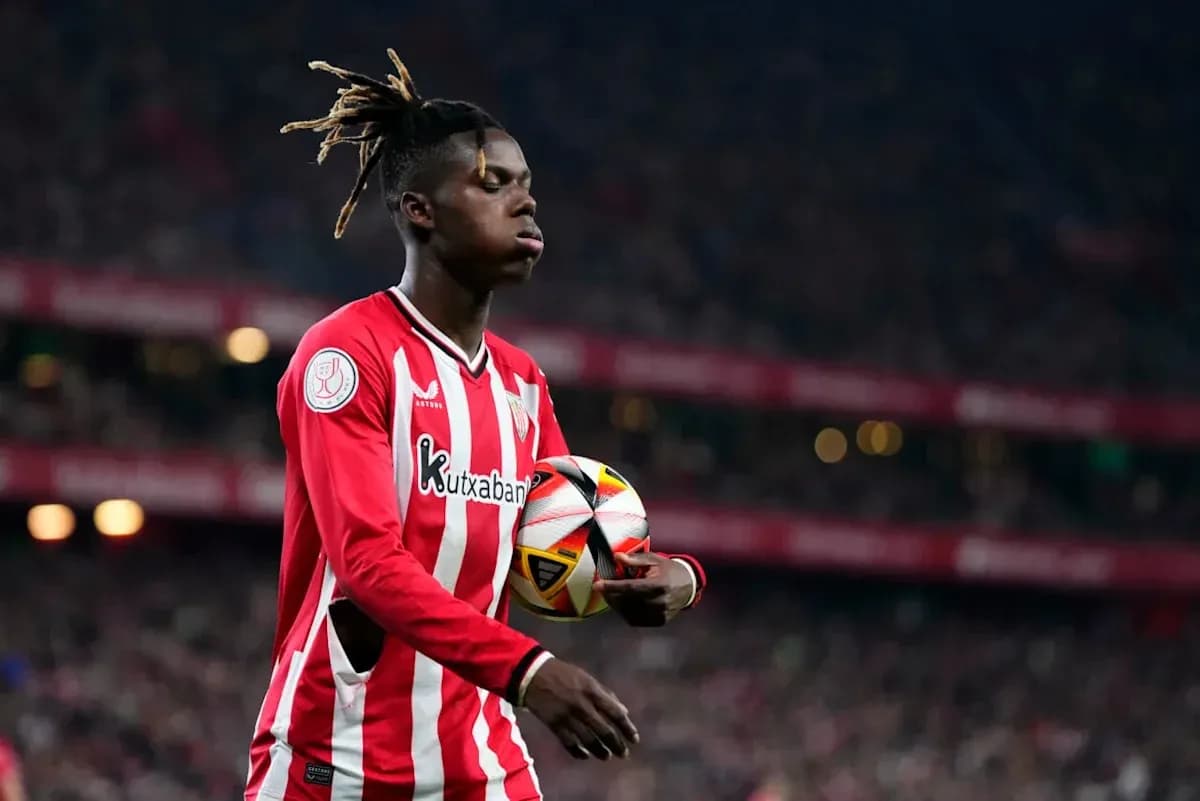 Player holding the ball during a match