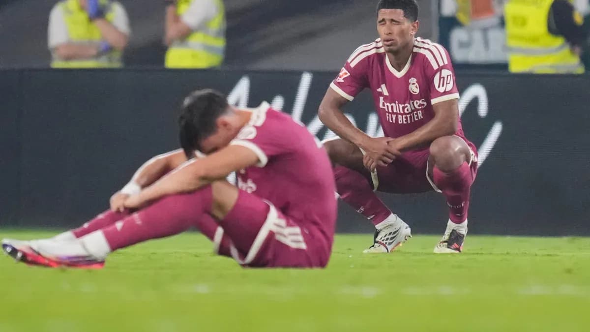 Real Madrid players reacting after match defeat