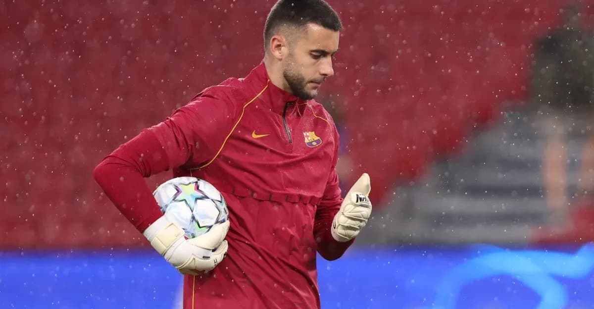 Goalkeeper warming up in rain before match