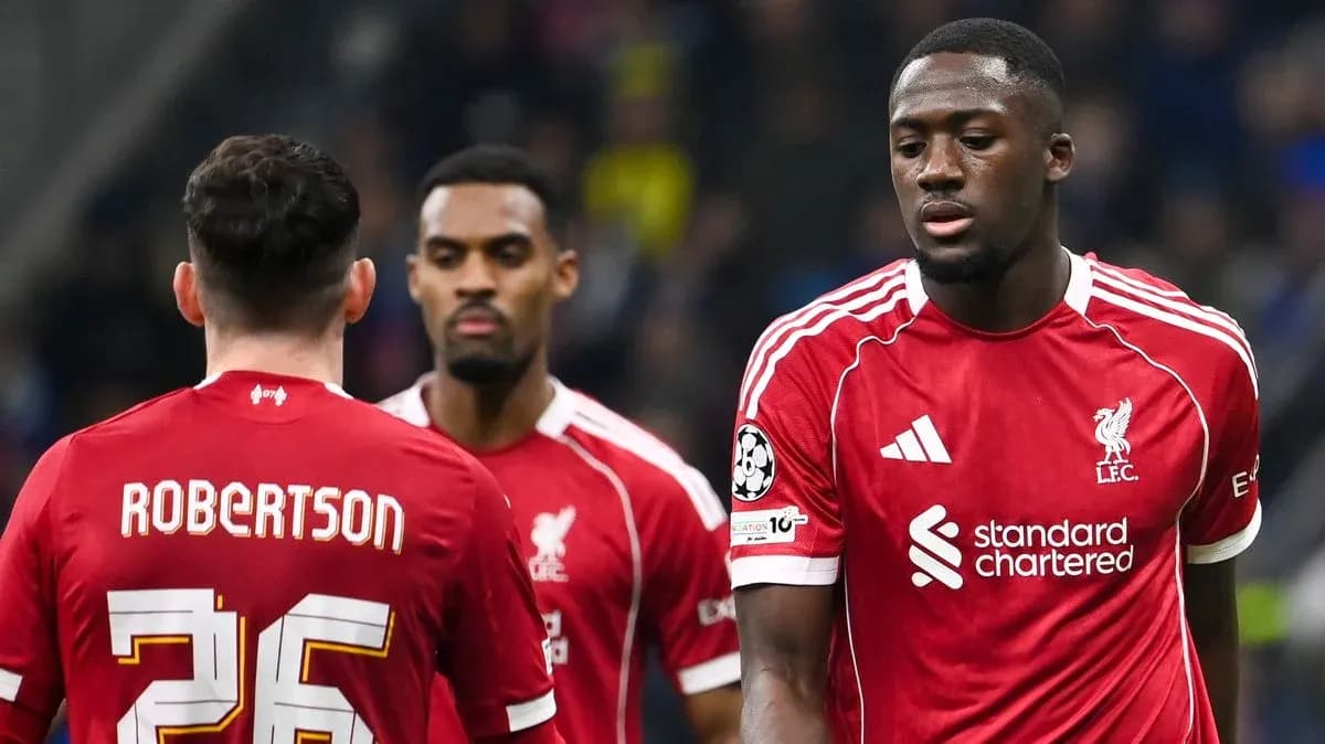 Liverpool players discussing on the pitch during match