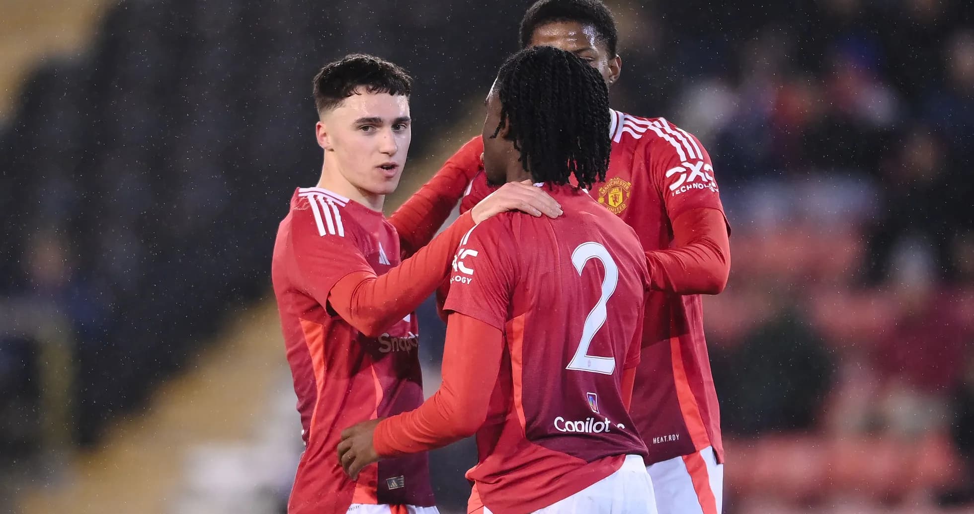 Manchester United players celebrating during a match
