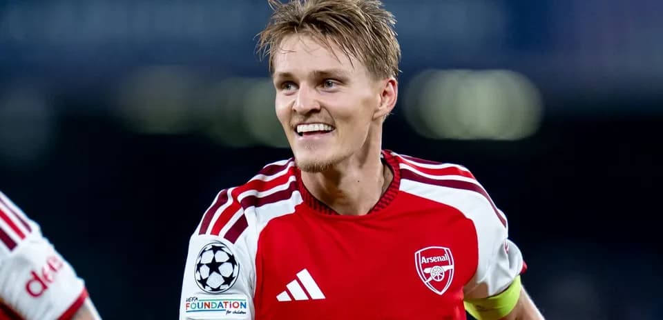 Arsenal player celebrating after scoring a goal