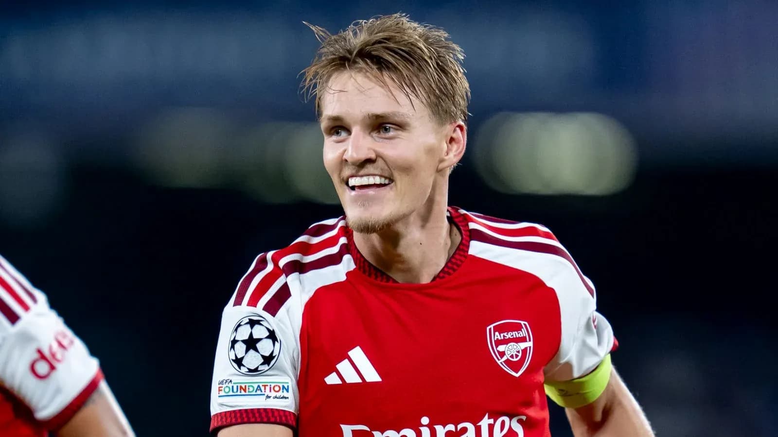 Arsenal player celebrating after scoring a goal