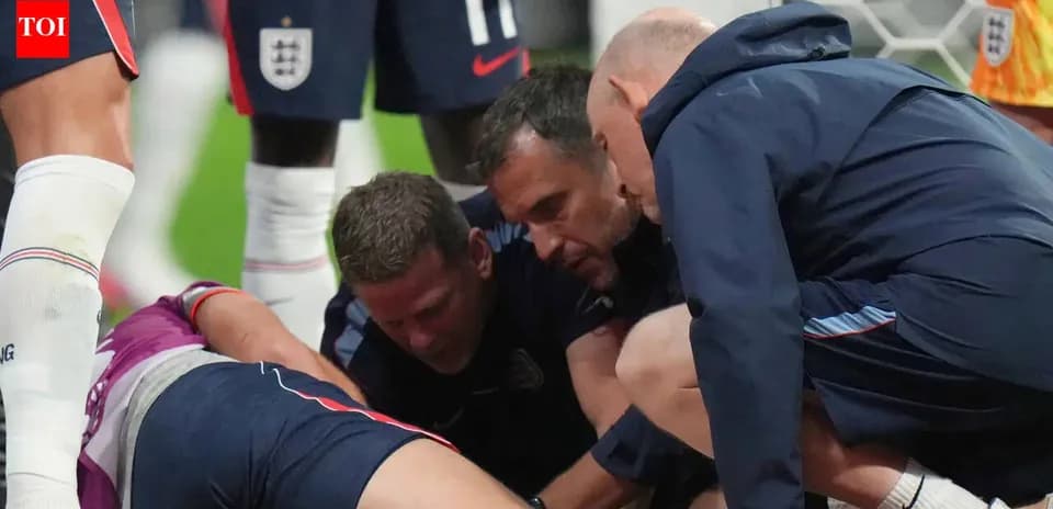 Medical team attending to injured player on field