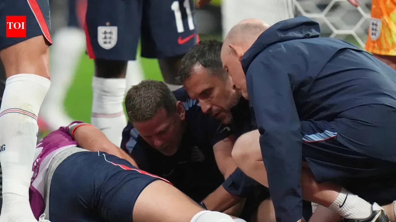 Medical team attending to injured player on field