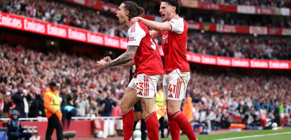 Arsenal players celebrating a goal during match