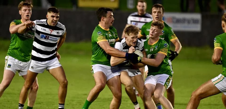 Players competing for the ball in a match