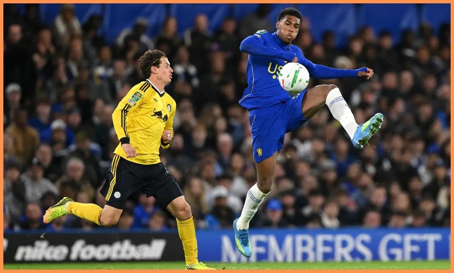 Player kicking the ball during a football match