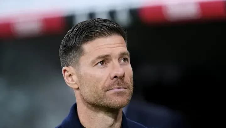 Football manager observing the match from sidelines