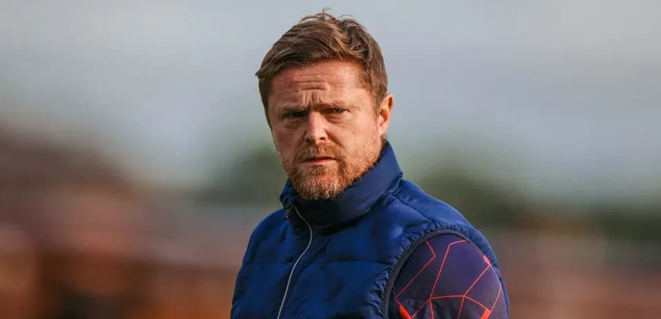 Coach observing the training session from sidelines