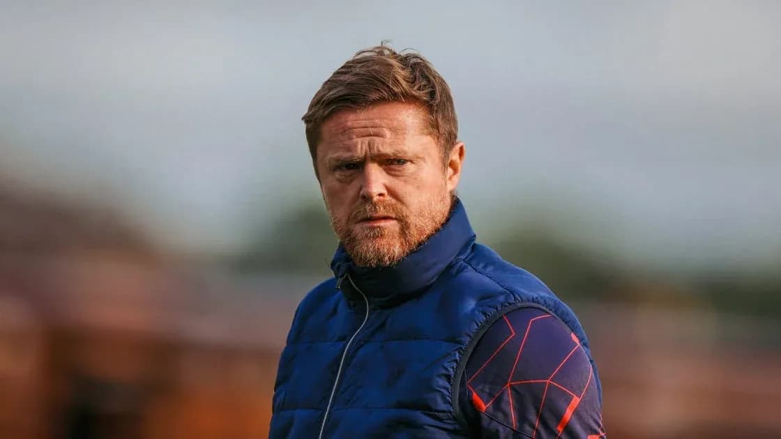 Coach observing the training session from sidelines