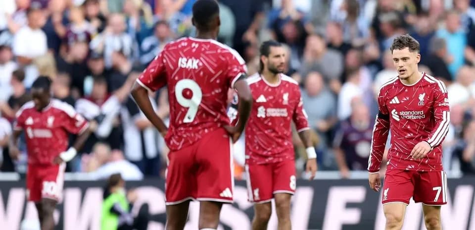 Liverpool players on the pitch during match
