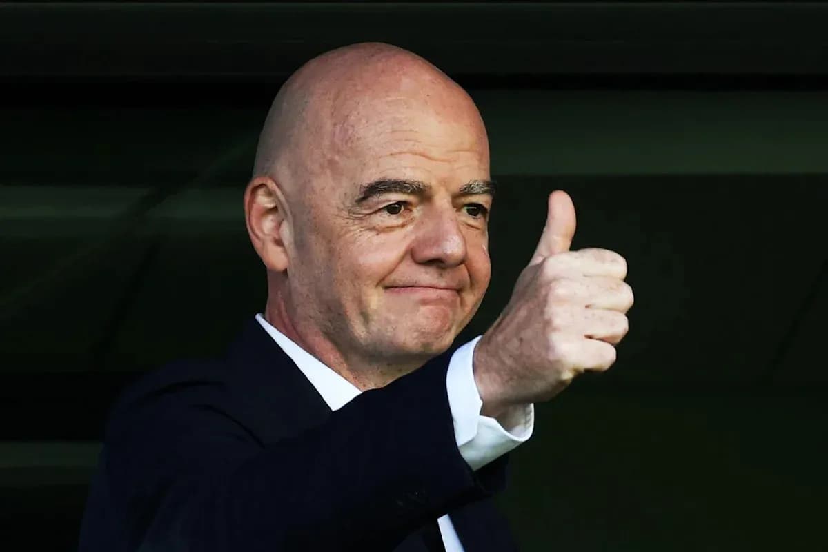 Official giving a thumbs up from the stands