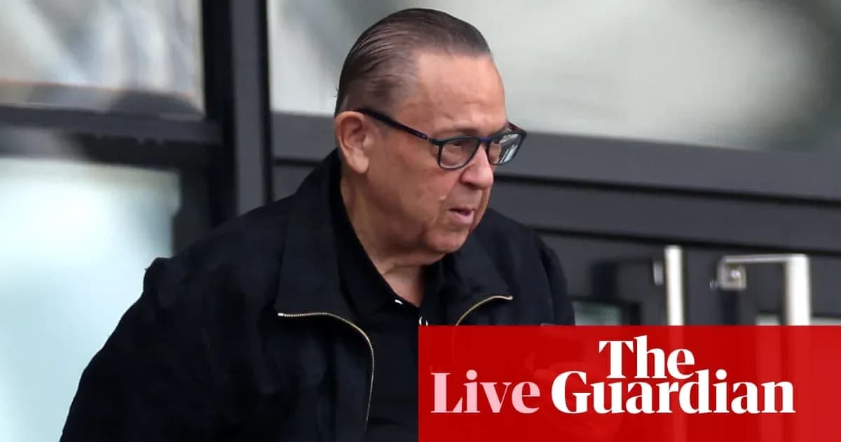 Man walking outside with glasses and black jacket