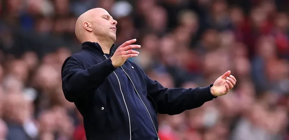 Coach gesturing during a match on the sidelines