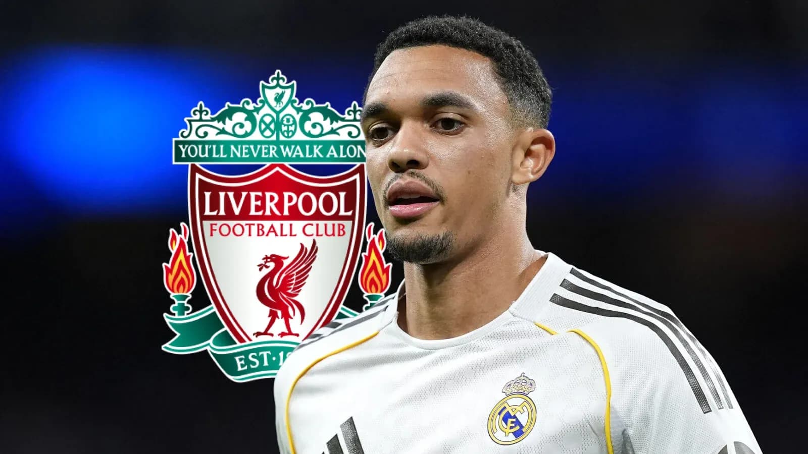 Futbolçunun Liverpool logosu arxasında görüntüsü Futbolçunun Liverpool logosu arxasında görüntüsü