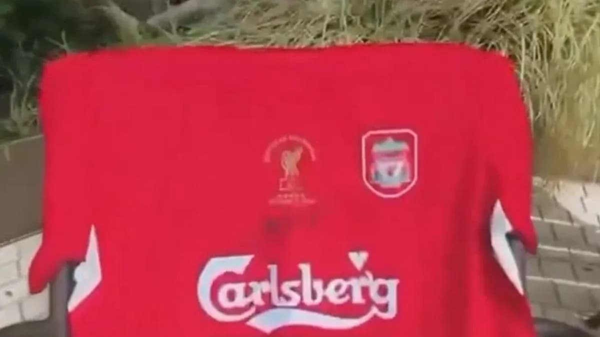 Liverpool FC red jersey displayed outdoors
