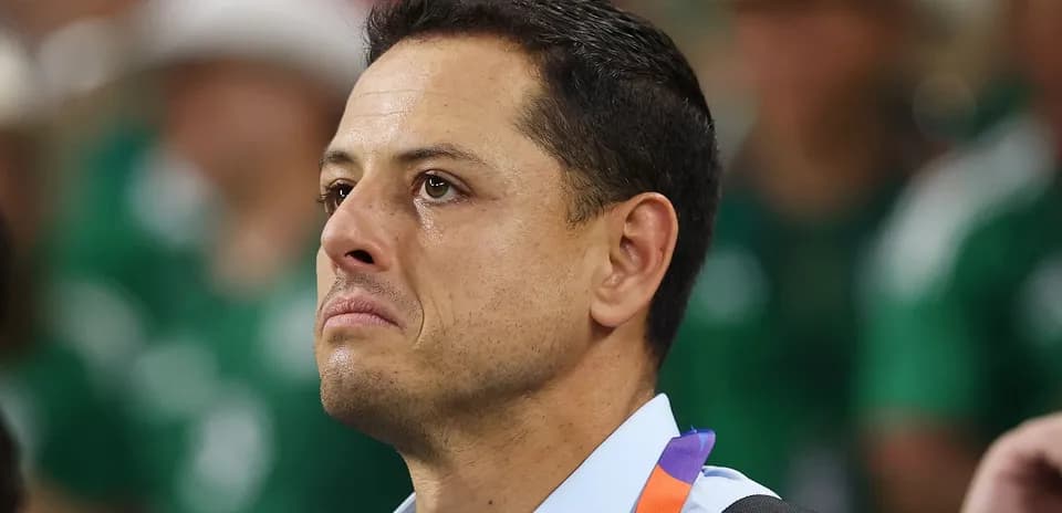 Man with tearful expression in crowd background