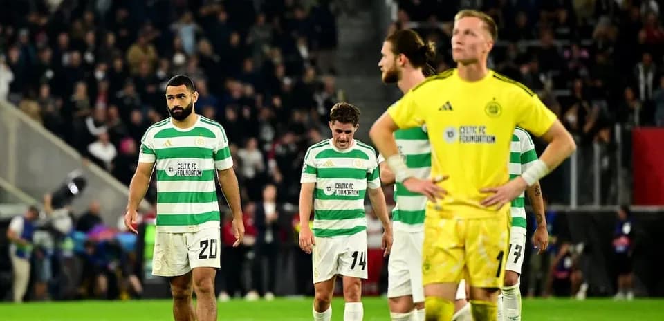 Celtic players walking off after match defeat