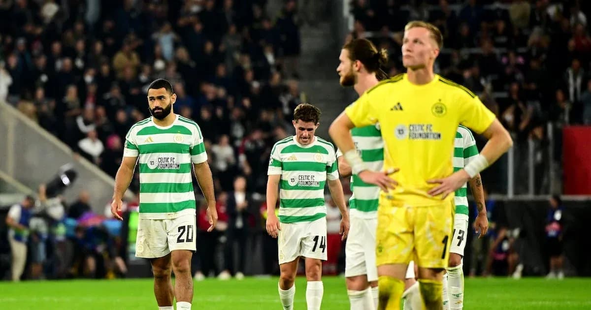 Celtic players walking off after match defeat
