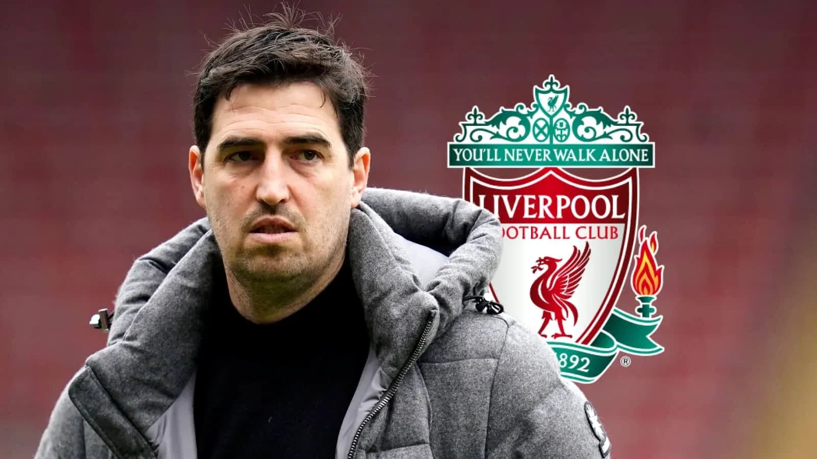 Coach standing in front of Liverpool logo