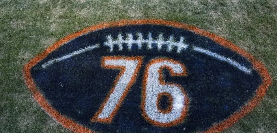 Football field marking with number 76