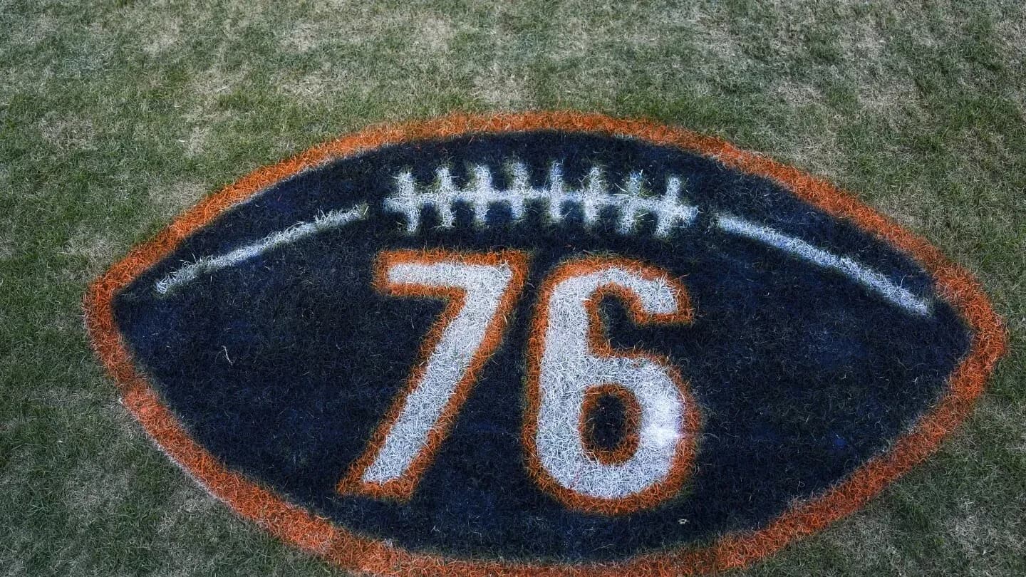 Football field marking with number 76