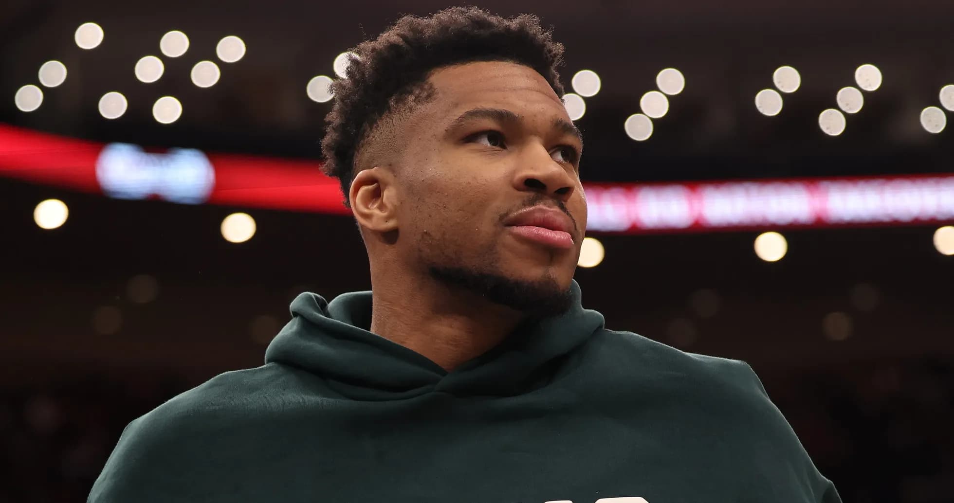 Basketball player on court during warm-up session