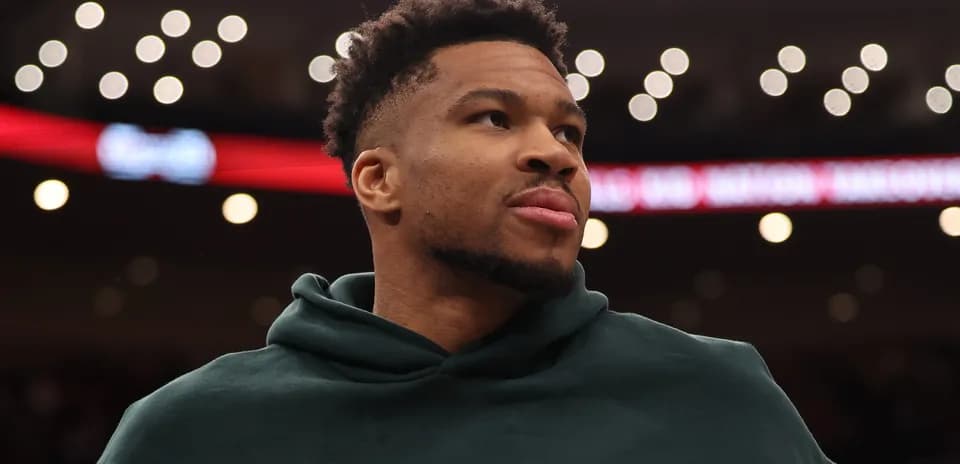 Basketball player on court during warm-up session