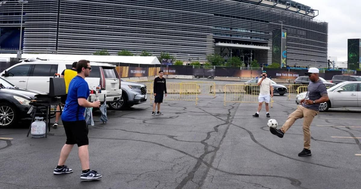 Group of people playing soccer in parking lot