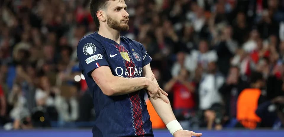 PSG player gesturing to the crowd during match