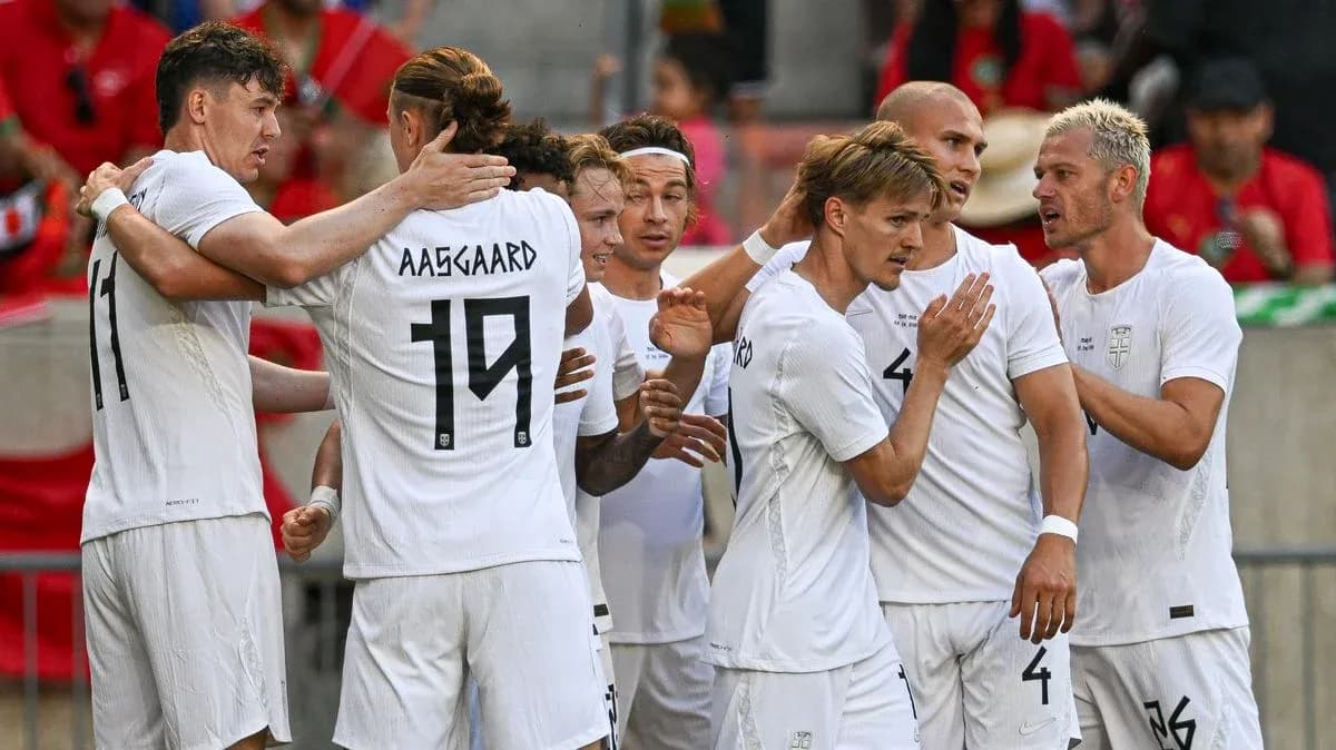 Players celebrating a goal during football match