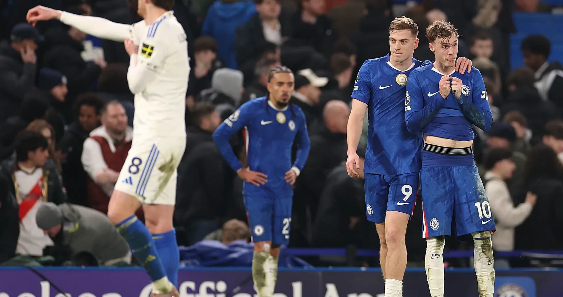 Chelsea players walking off after match defeat