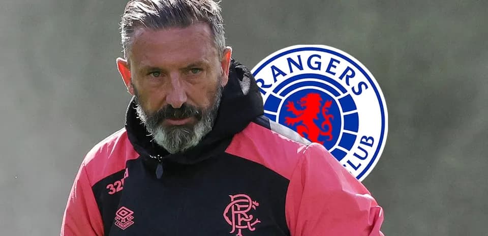 Coach during training session with Rangers FC logo
