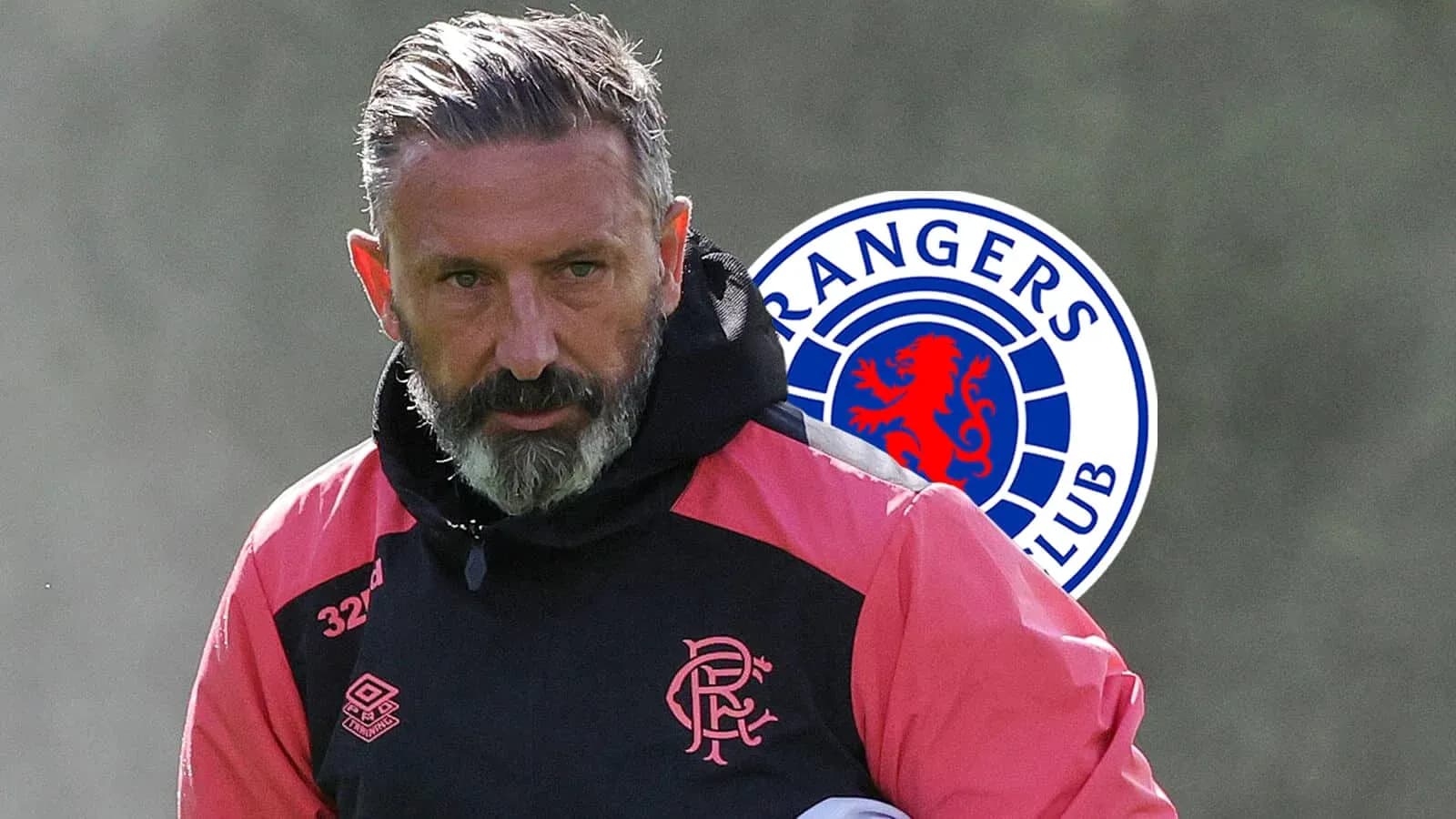 Coach during training session with Rangers FC logo