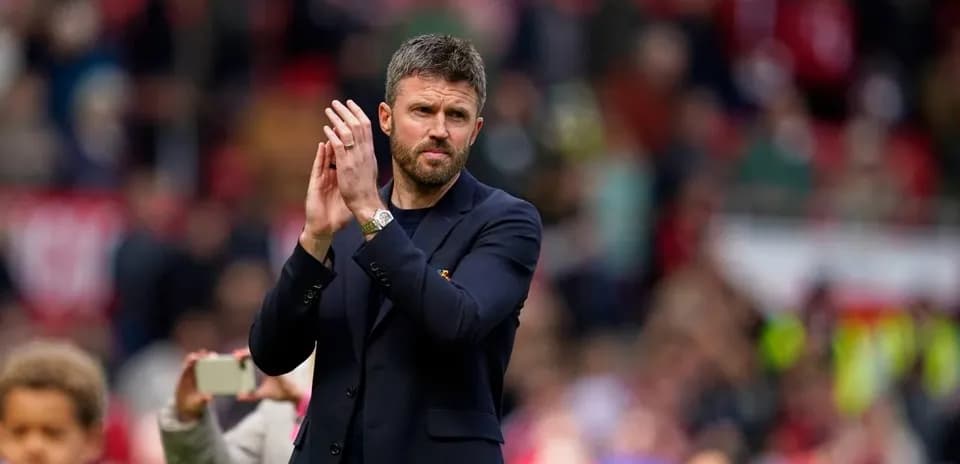Coach applauding fans during match celebration