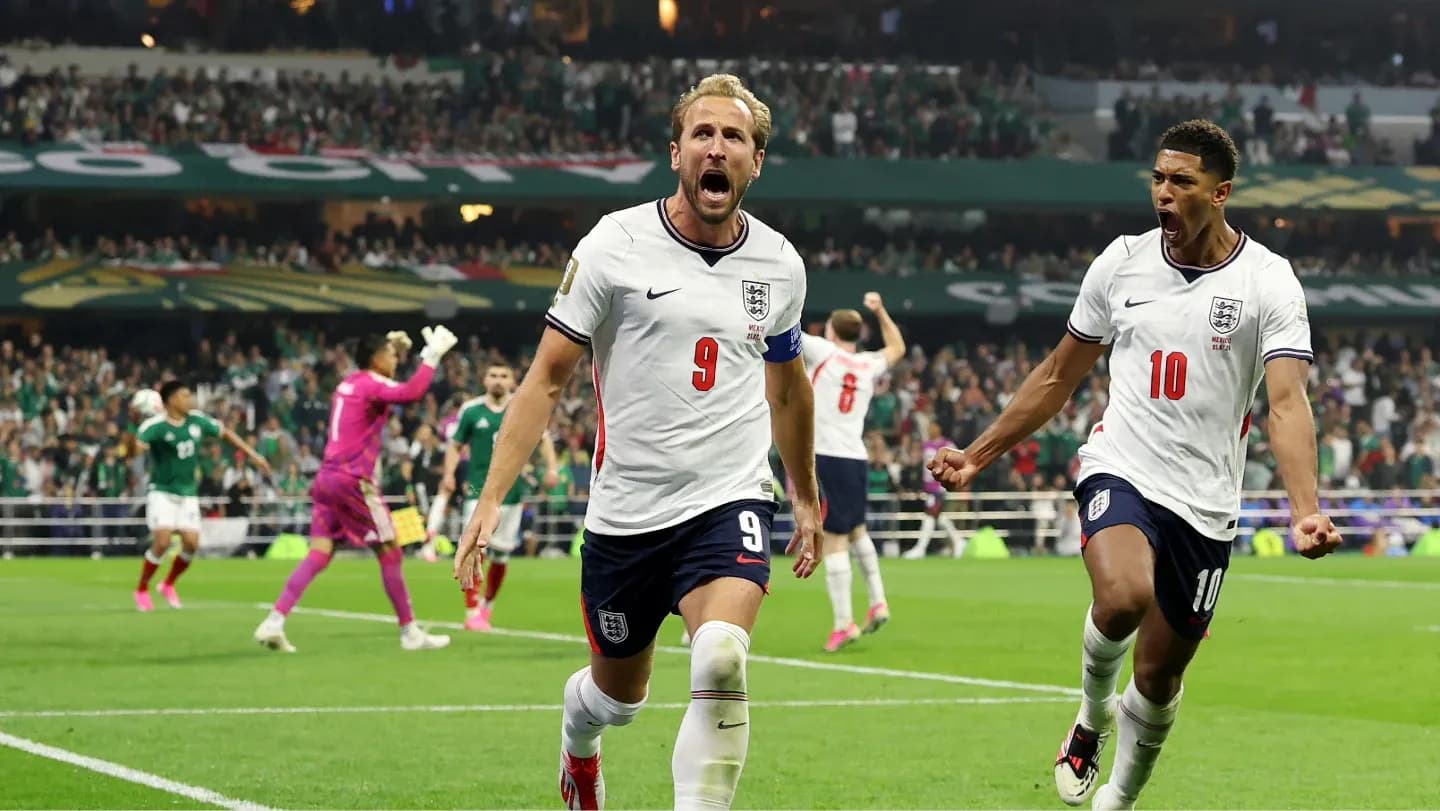 Harry Kane celebrating goal with teammate during match