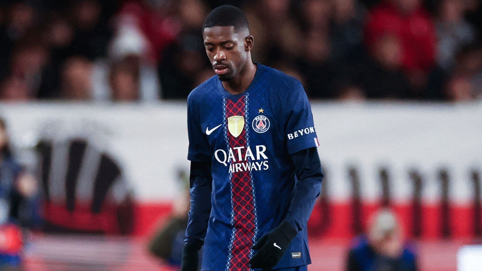 PSG player walking on the field during match