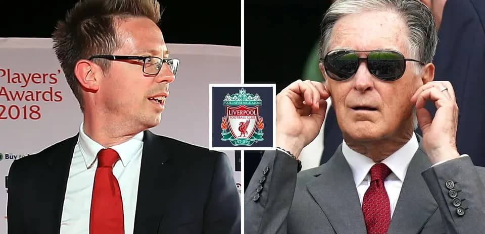 Two individuals at Liverpool FC event backdrop
