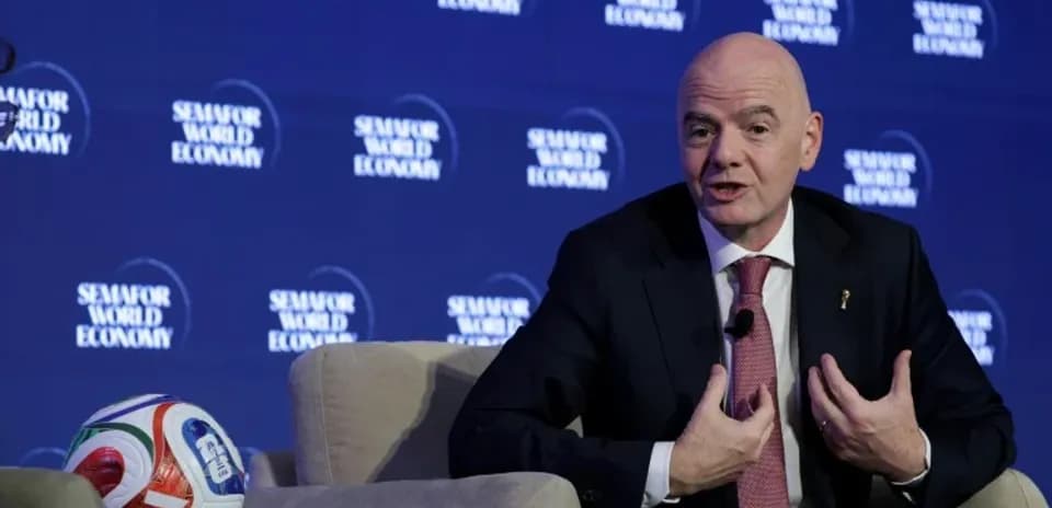FIFA president speaking at seminar with football