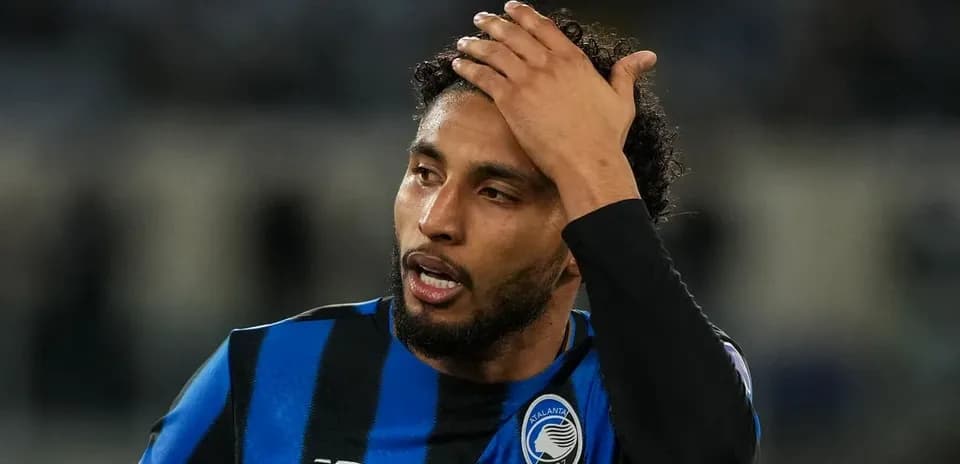 Atalanta player looking concerned during match