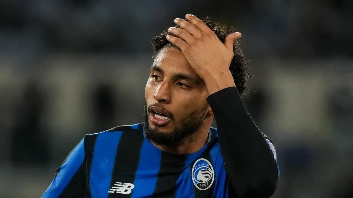 Atalanta player looking concerned during match