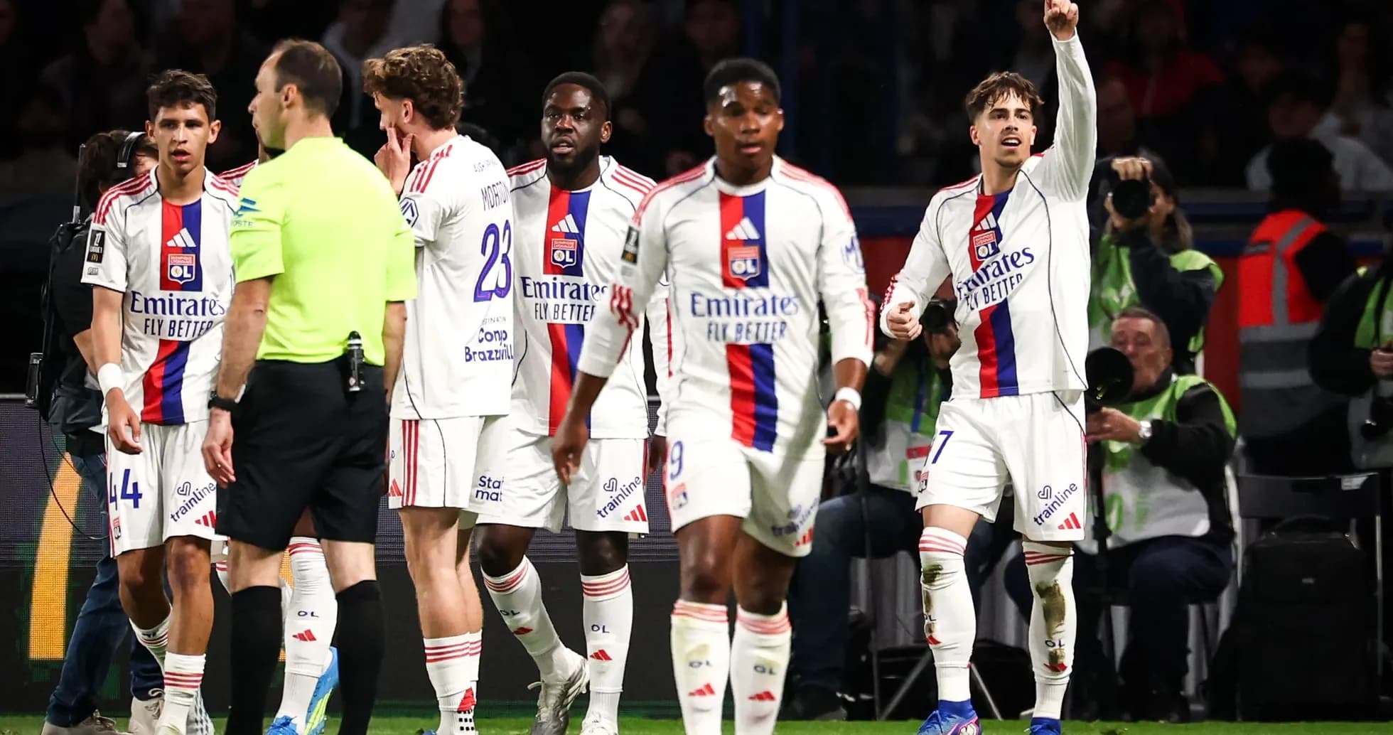 Lyon players celebrating a goal during the match
