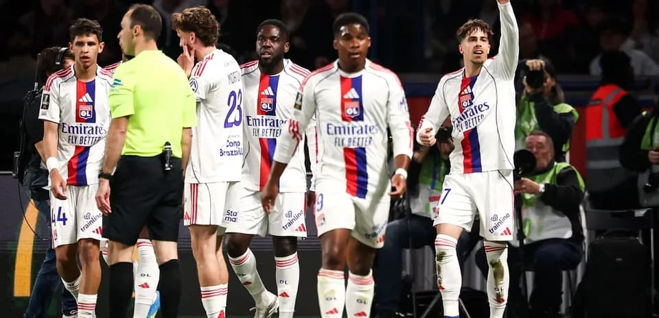 Lyon players celebrating a goal during the match