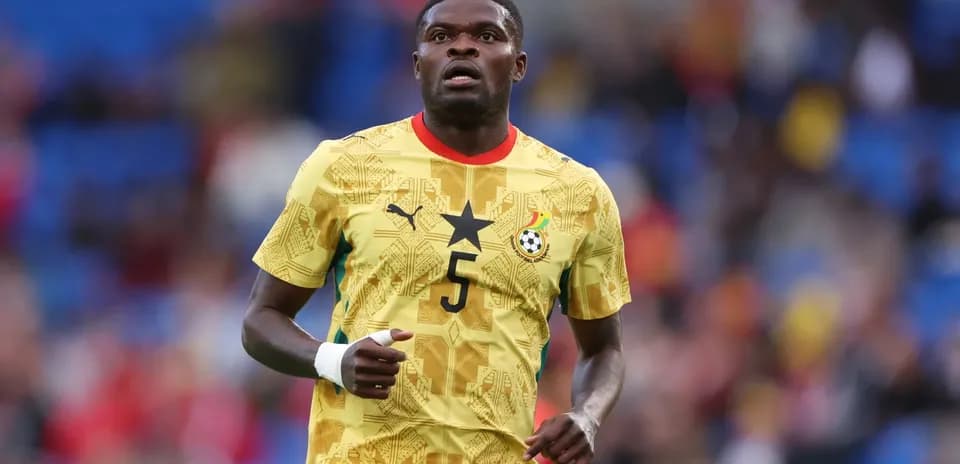 Ghana player wearing yellow jersey on the field